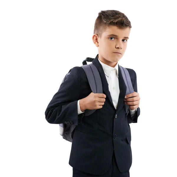 Menino de escola frustrado com sacos escolares — Fotografia de Stock