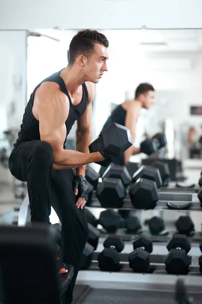 Man doing exercises dumbbell bicep muscles — Stock Photo, Image