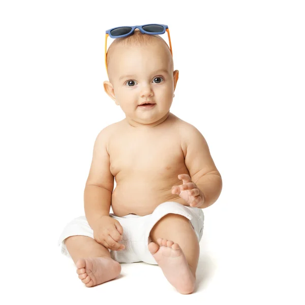 Baby sitting on a white background — Stock Photo, Image