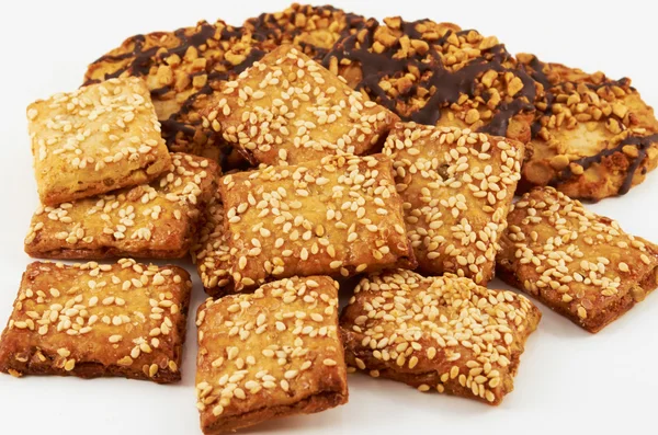 Cookies.A handful of cookies with peanuts and sesame seeds — Stock Photo, Image