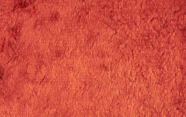 Background.Old-fashioned fluffy red velvet as background