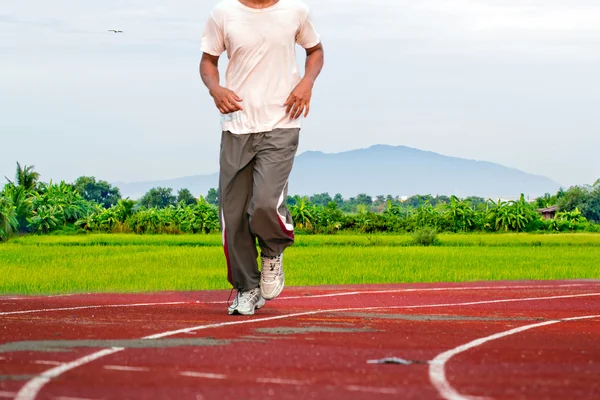 runner running in the light of evening