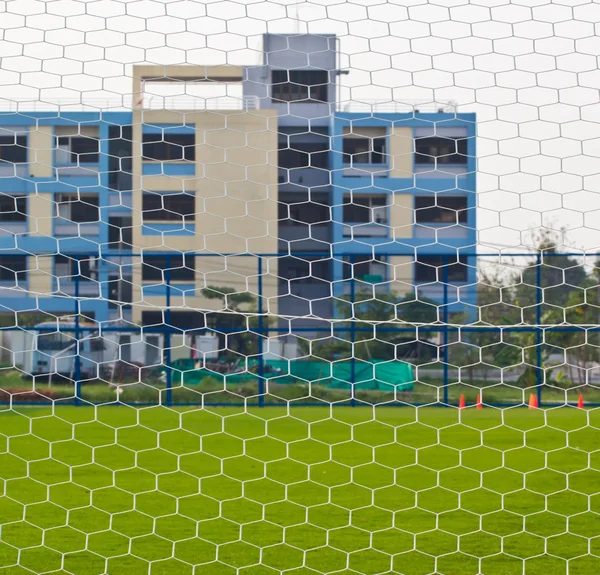 Goalpost dettaglio netto con erba verde sfocatura in sport di sfondo c — Foto Stock