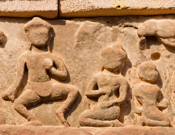 Ancient Khmer lintel carved with a kala demon figure sitting on — Stock Photo, Image