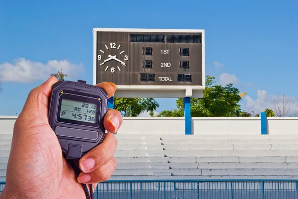 Stopwatch in athletics field — Stock Photo, Image