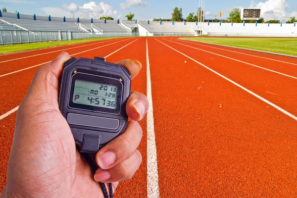 Stopwatch op atletiekgebied — Stockfoto