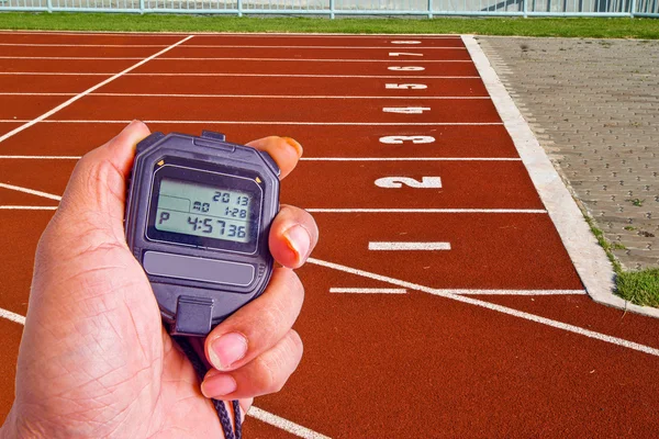 Stopwatch in athletics field — Stock Photo, Image