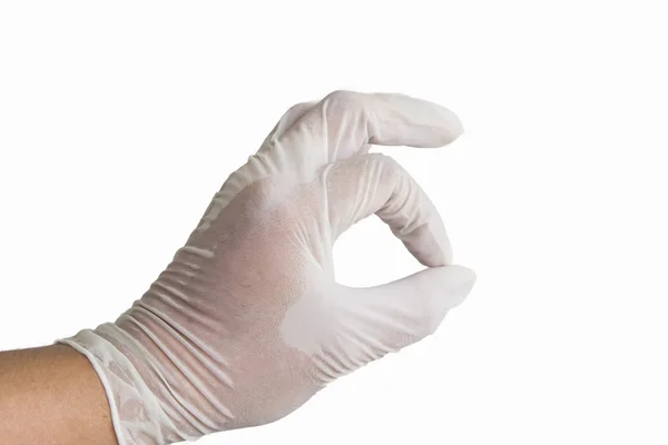 Man arts trekken op witte chirurgische handschoenen. — Stockfoto