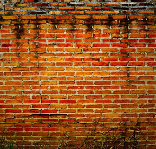 Fondo de una antigua pared de ladrillo —  Fotos de Stock