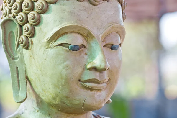 Faccia buddha fa di cera — Foto Stock