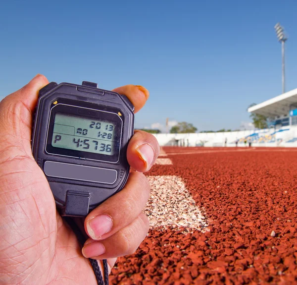 Stopwatch in athletics field — Stock Photo, Image