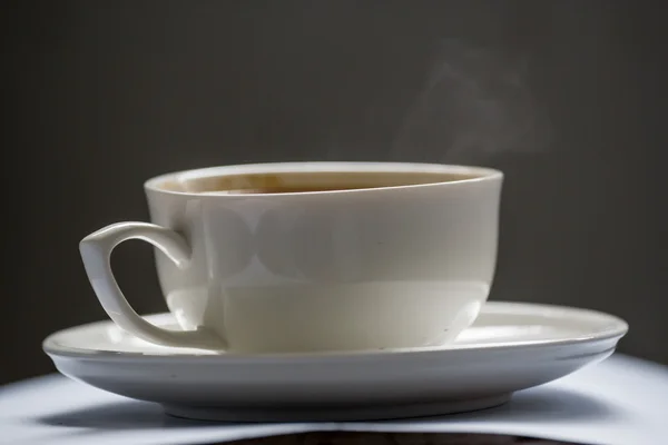 Coffee cup and coffee beans — Stock Photo, Image