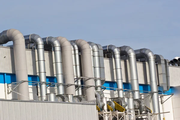 Ventilation pipes of an air conditionon a roof top. — Stock Photo, Image