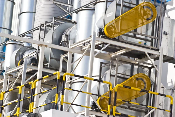 Pipes on exterior of modern factory building. — Stock Photo, Image