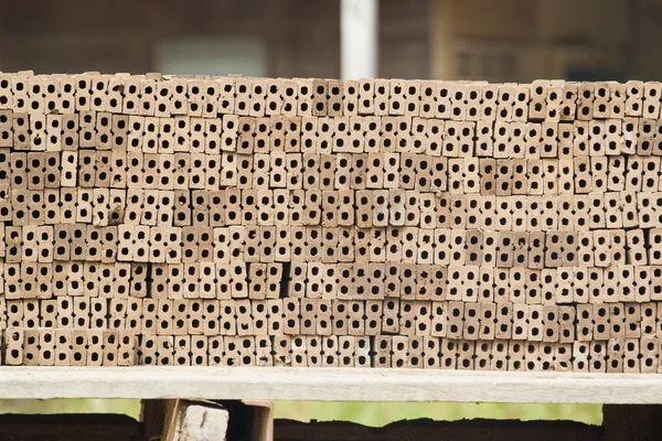 Raw bricks on background — Stock Photo, Image