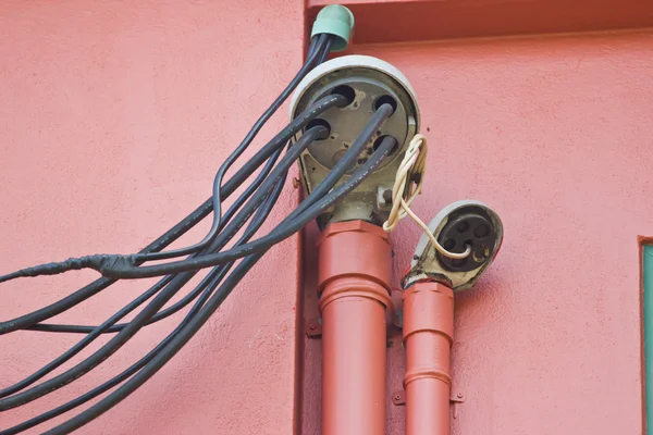 Wall with pipe painted and decorated — Stock Photo, Image