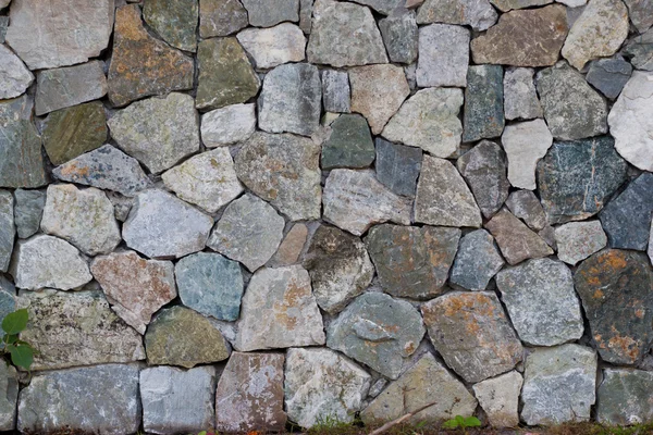 Elegante muro di pietra da piccole parti quadrate — Foto Stock