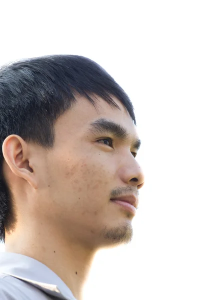 Young man staring up — Stock Photo, Image