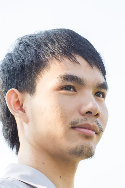 Young man staring up — Stock Photo, Image