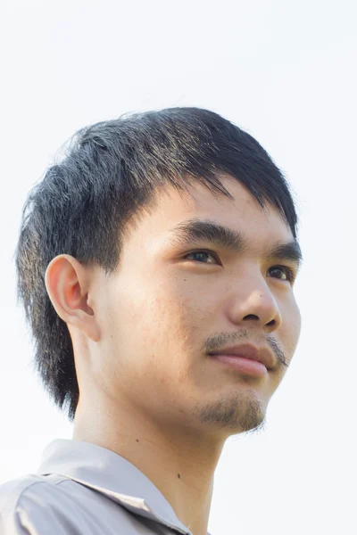 Young man staring up — Stock Photo, Image