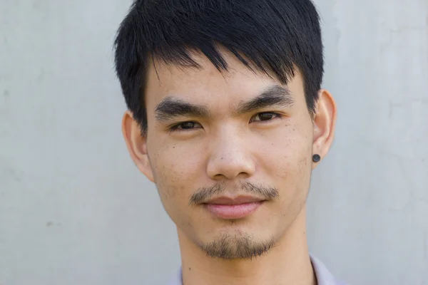 Asian Young man smiling, portrait — Stock Photo, Image