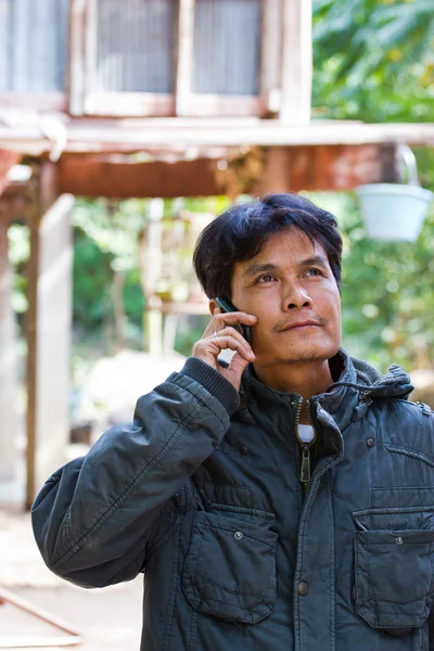 Man talking on the phone and smiling — Stock Photo, Image