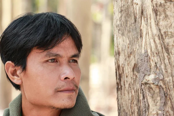 Close-up portrait of a man. Looking up into the corner. — Stock Photo, Image