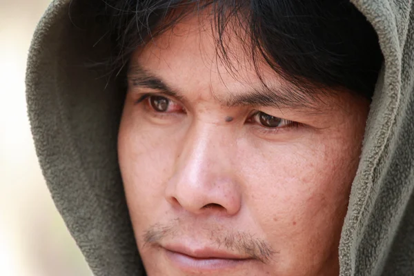 Close-up portrait of a man. Looking up into the corner. — Stock Photo, Image