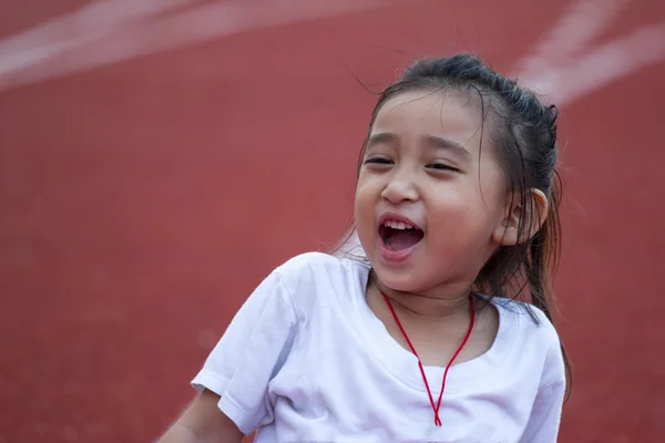 Cheerful girl in sports stadium — Stock Photo, Image