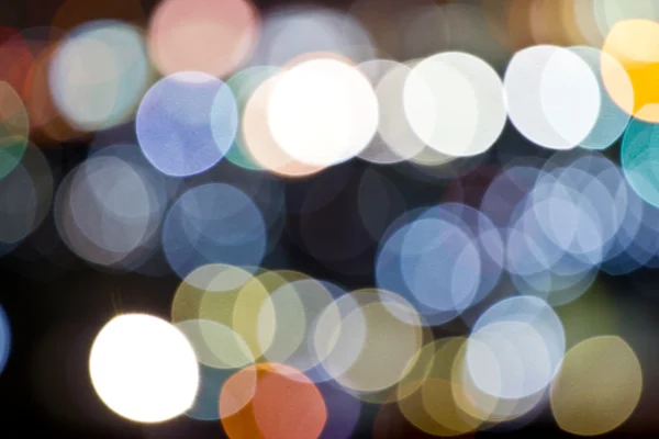 Abstrato circular bokeh luzes fundo de Christmaslight . — Fotografia de Stock