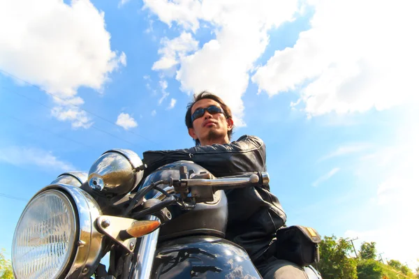 Young man with motor bike — Stock Photo, Image