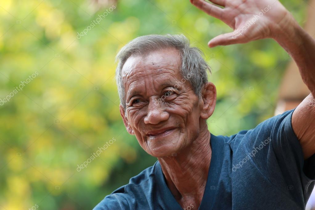 Happy old man smiling Stock Photo by ©thailandonly 37869855