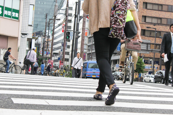 TOKYO, JAPAN-JUNE 2: Unidentified pedestrians at Shibuya crossin