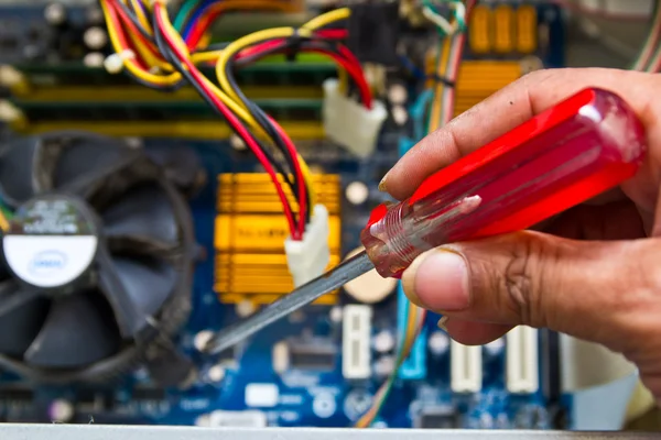 Technician repairing computer hardware in the lab — Stock Photo, Image