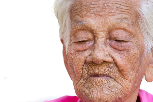 Porträtt av en orolig gammal kvinna med ett sorgligt uttryck — Stockfoto