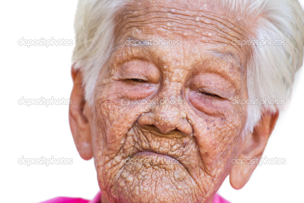 portrait of a worried old woman with a sad expression
