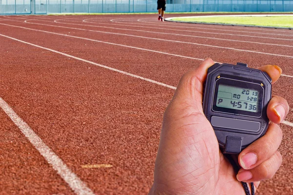 Stopwatch op atletiekgebied — Stockfoto