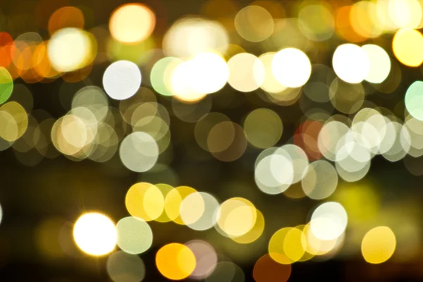 Abstraktní kruhový bokeh osvětlení pozadí Christmaslight. — Stock fotografie