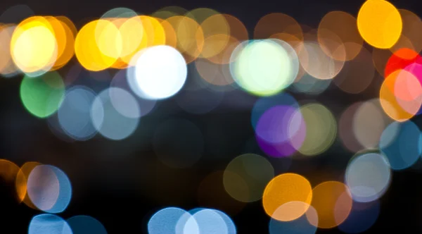 Abstrato circular bokeh luzes fundo de Christmaslight . — Fotografia de Stock