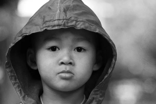 Asian boy on a cold winter day — Stock Photo, Image