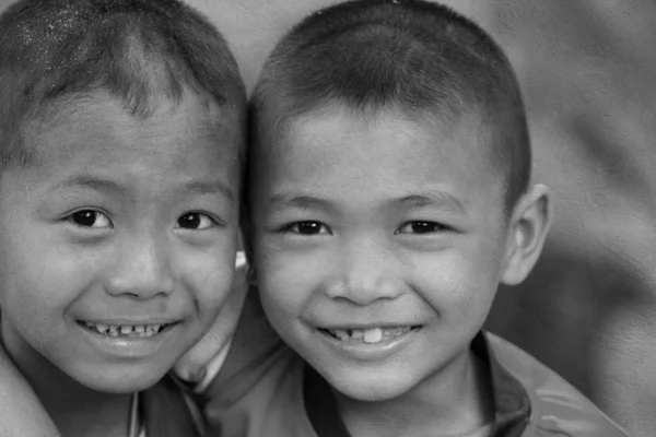 Two little friends hugging each other — Stock Photo, Image