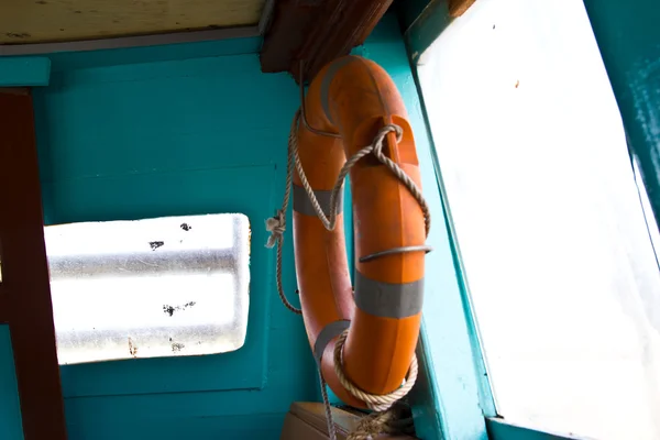 Life Buoy attached to a Wooden Paneled Wall with Plenty of Copy — Stock Photo, Image