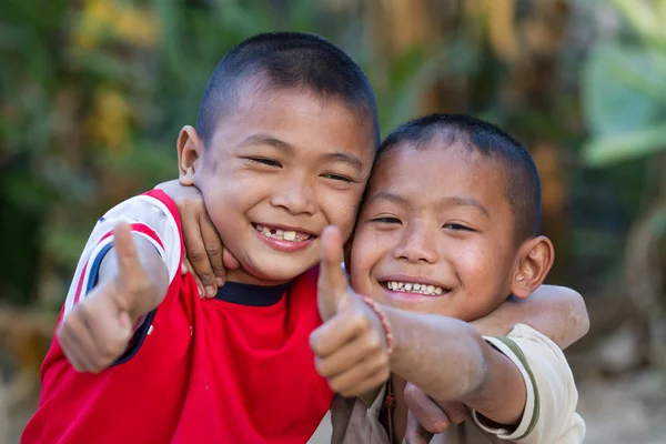 Two little friends hugging each other — Stock Photo, Image