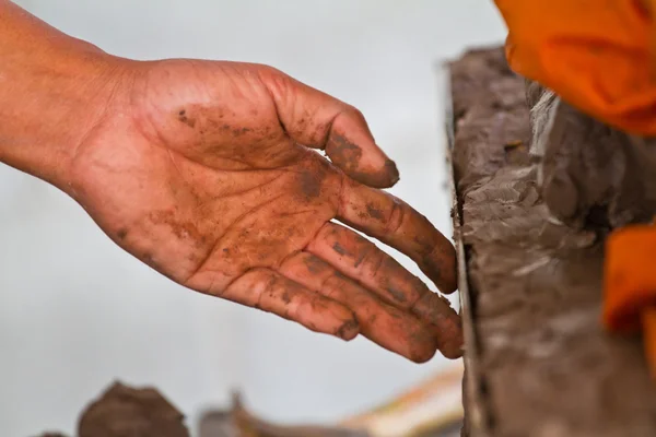 Hands of potter in clay — Stock Photo, Image