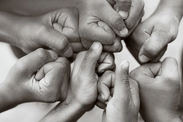 Hands of  family together closeup on autumn background — Stock Photo, Image