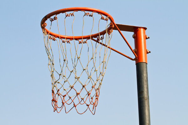 basket ball board under blue sky with white clouds