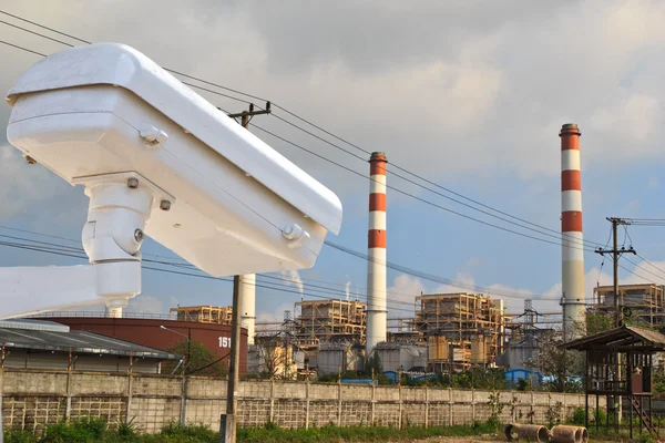 Security camera detects the movement of traffic. Skyscraper roof