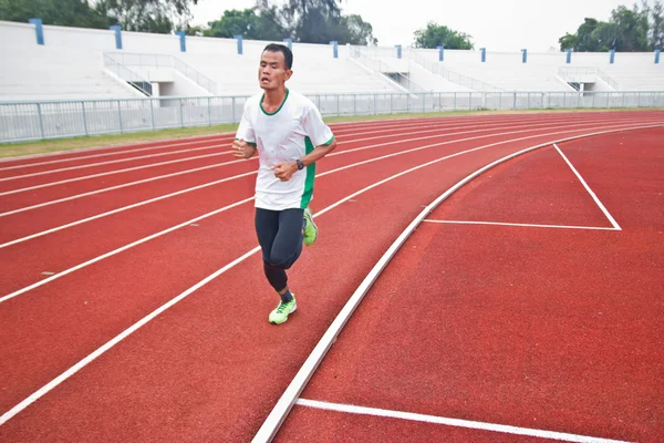 Runner rekabetçi çalışan kırpılmış görüntü — Stok fotoğraf