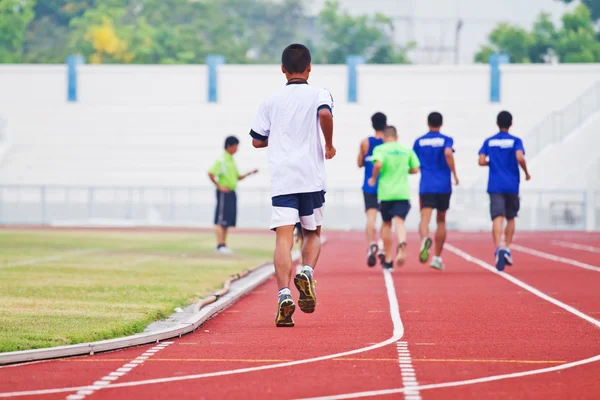 Cropped image of  runner on competitive running — Stock Photo, Image