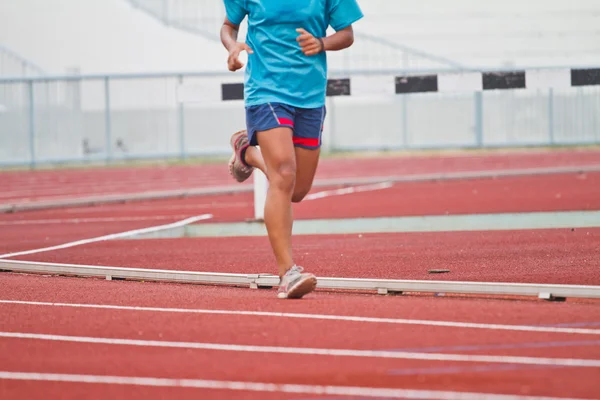 Cropped image of  runner on competitive running — Stock Photo, Image